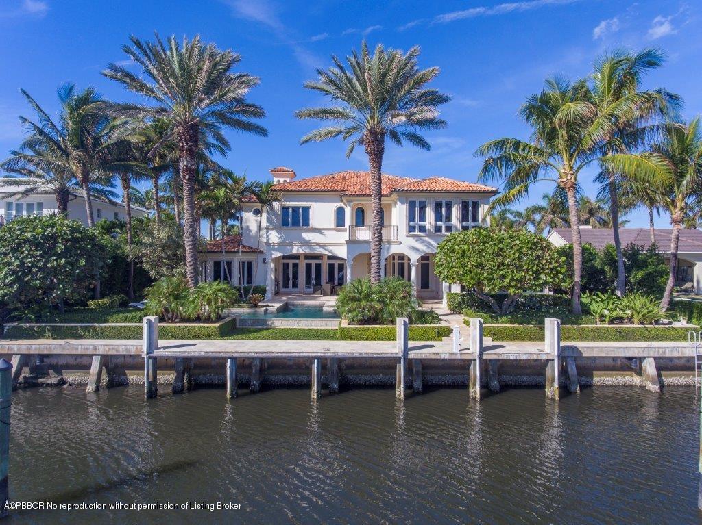 95 Curlew Road Manalapan, FL 33462 - Photo 1 of 36 a view of swimming pool with outdoor seating and a patio
