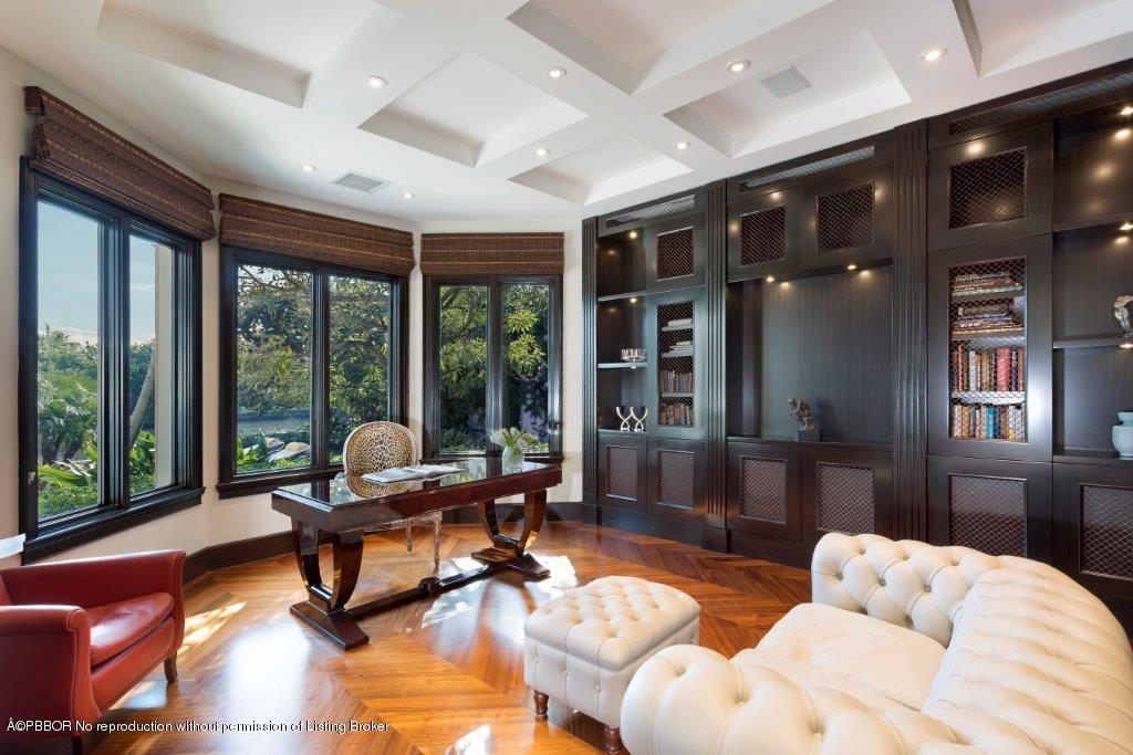 95 Curlew Road Manalapan, FL 33462 - Photo 13 of 36 a living room with furniture and floor to ceiling windows