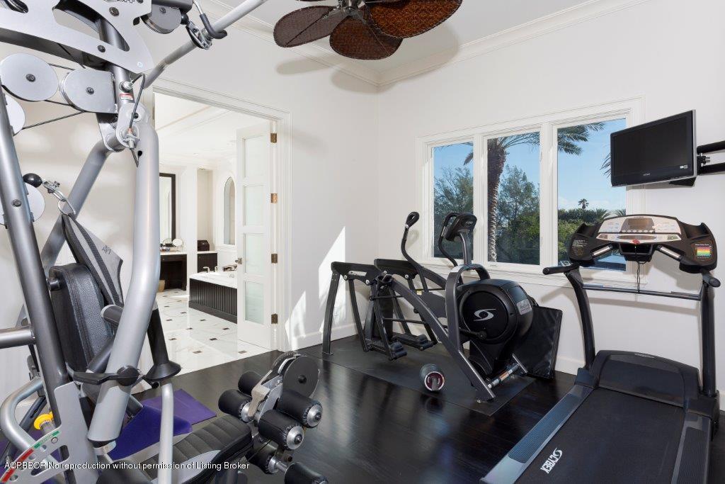 95 Curlew Road Manalapan, FL 33462 - Photo 18 of 36 a view of a room with gym equipment