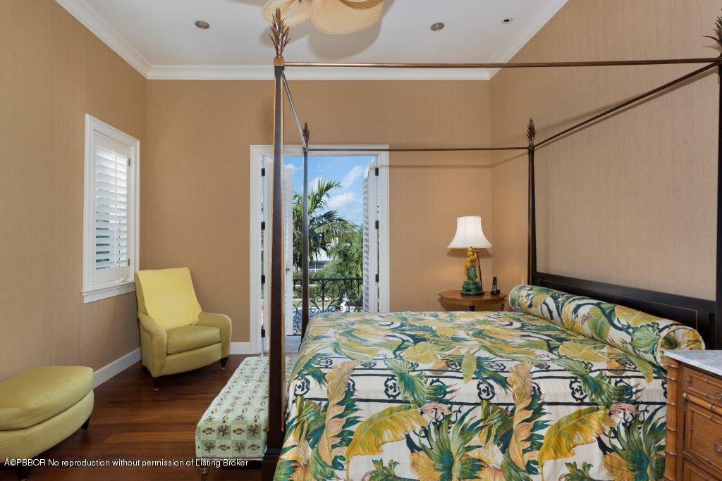 95 Curlew Road Manalapan, FL 33462 - Photo 19 of 36 a bedroom with a bed and window
