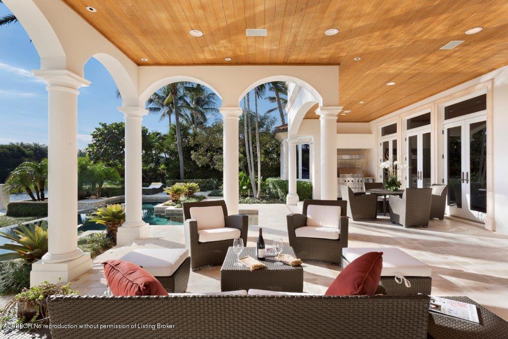 95 Curlew Road Manalapan, FL 33462 - Photo 24 of 36 a view of a livingroom with furniture and floor to ceiling window