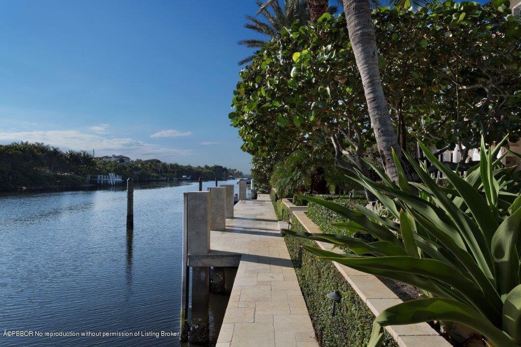 95 Curlew Road Manalapan, FL 33462 - Photo 36 of 36 a view of a pathway both side of building