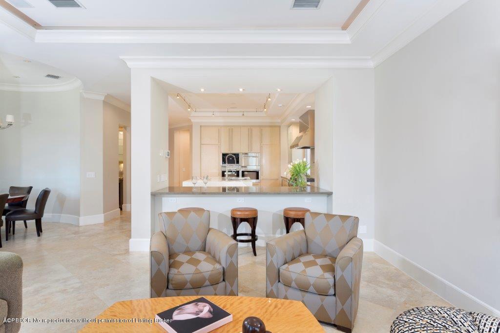 95 Curlew Road Manalapan, FL 33462 - Photo 9 of 36 a living room with furniture and a table