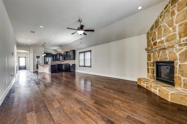 a view of a living room a fireplace with wooden floor