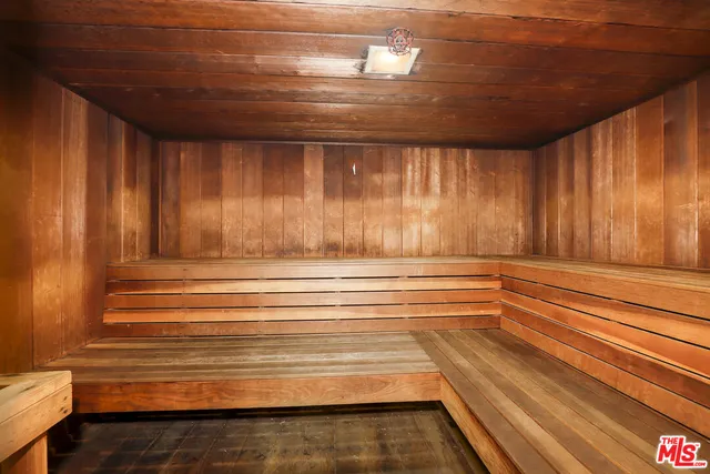 a view of room with window and a rug