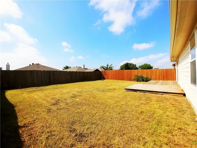 a view of a lake with a big yard