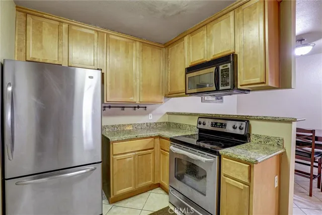 $485,000 | 1345 Cabrillo Park Drive, Unit R02, Santa Ana, CA 92701