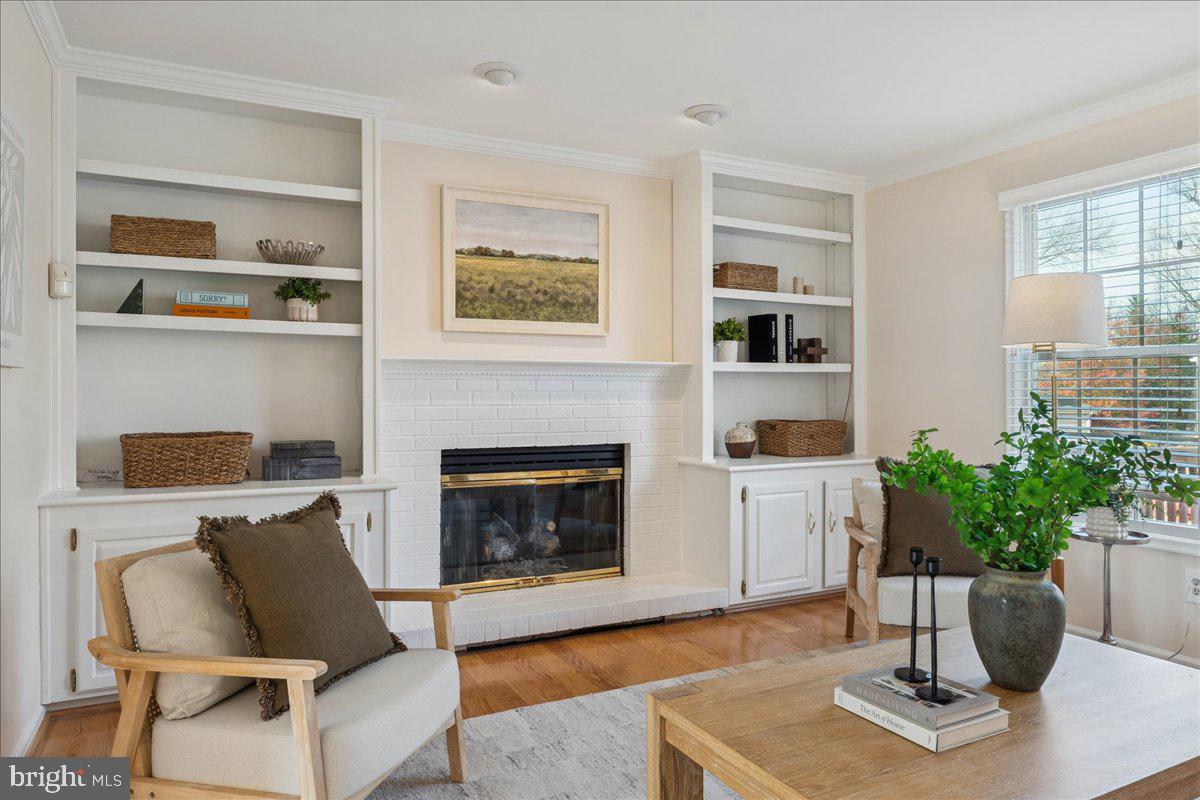 12546 Rock Ridge Road Herndon, VA 20170 - Photo 11 of 44 a living room with furniture and a fireplace