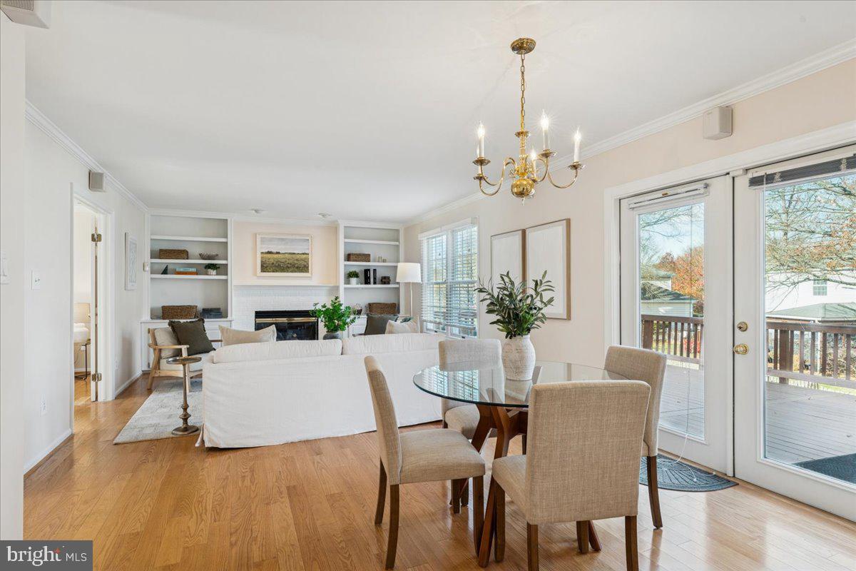 12546 Rock Ridge Road Herndon, VA 20170 - Photo 12 of 44 a view of a dining room with furniture window and wooden floor