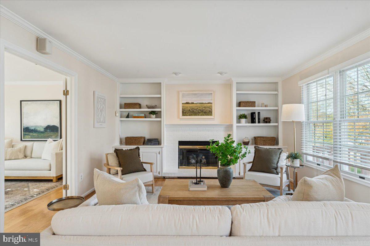 12546 Rock Ridge Road Herndon, VA 20170 - Photo 3 of 44 a living room with furniture and a fireplace