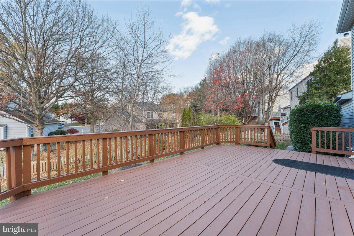 12546 Rock Ridge Road Herndon, VA 20170 - Photo 38 of 44 a view of deck with wooden floor and fence