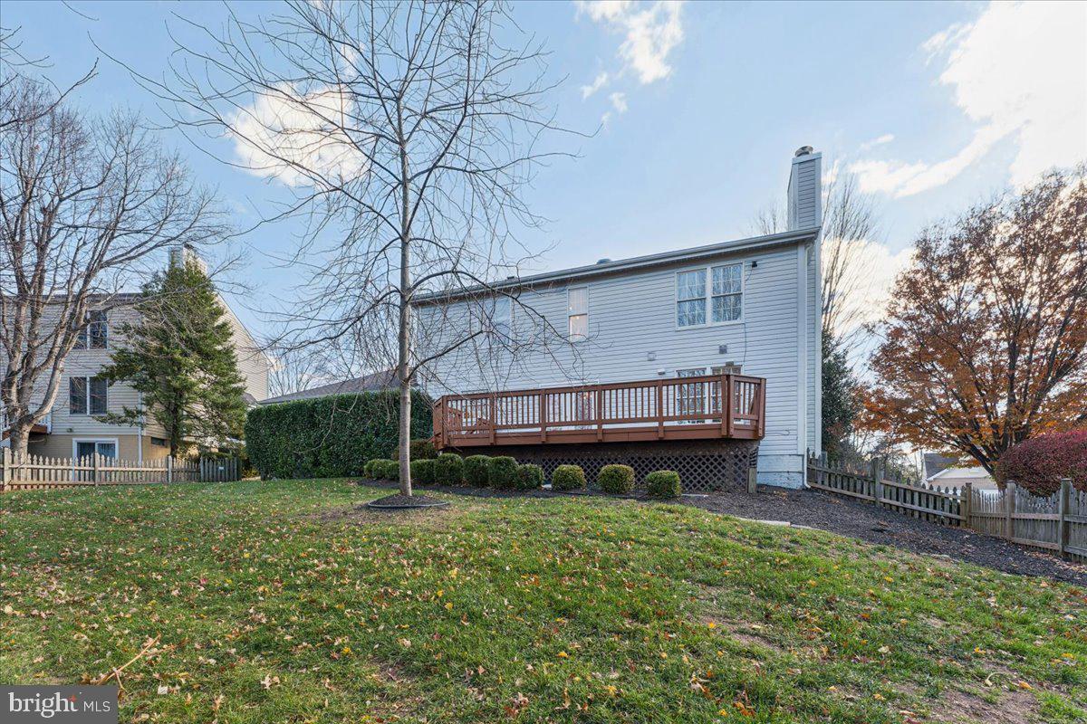 12546 Rock Ridge Road Herndon, VA 20170 - Photo 40 of 44 a view of a house with a yard