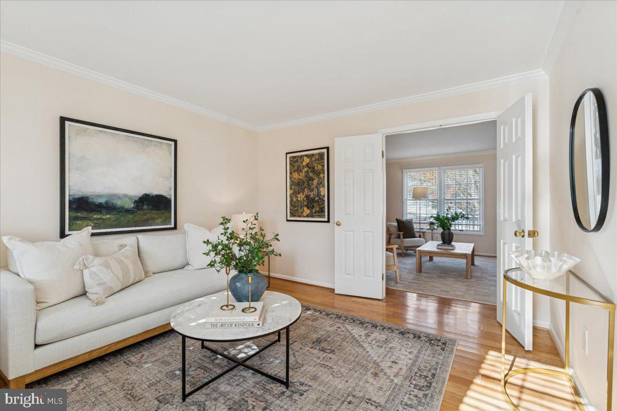 12546 Rock Ridge Road Herndon, VA 20170 - Photo 9 of 44 a living room with furniture and a mirror