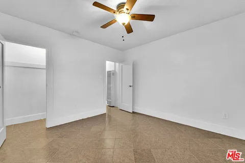 a view of balcony with furniture