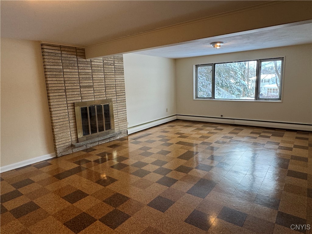 11 Northridge Road DeWitt, NY 13214 - Photo 34 of 43 Wood burning fireplace and backyard views through