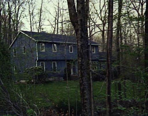 75 Lounsbury Road Ridgefield, CT 06877 - Photo 1 of 1 a view of house with yard and green space