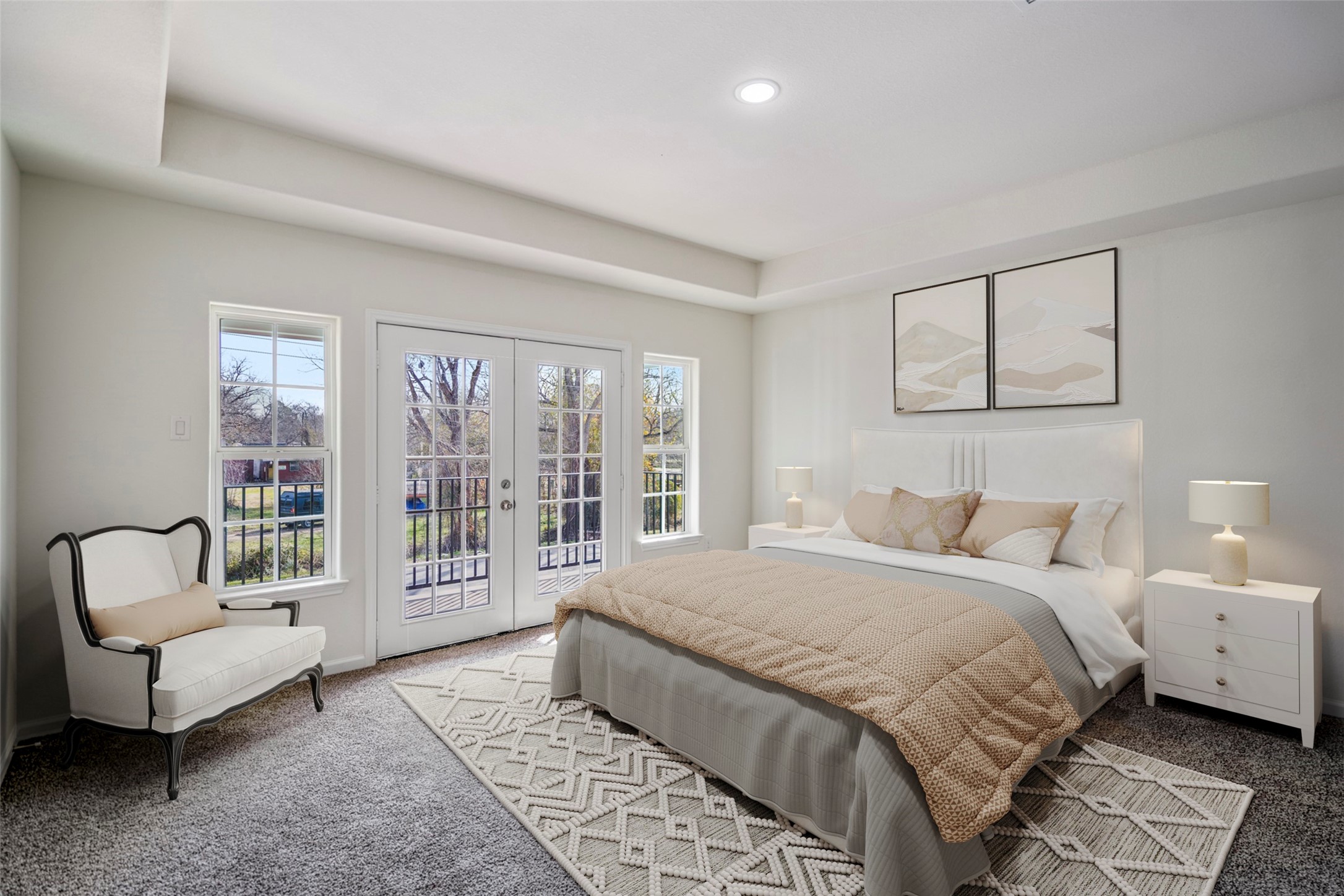 6513 Goldspier Street Houston, TX 77091 - Photo 12 of 31 a spacious bedroom with a bed and a couch