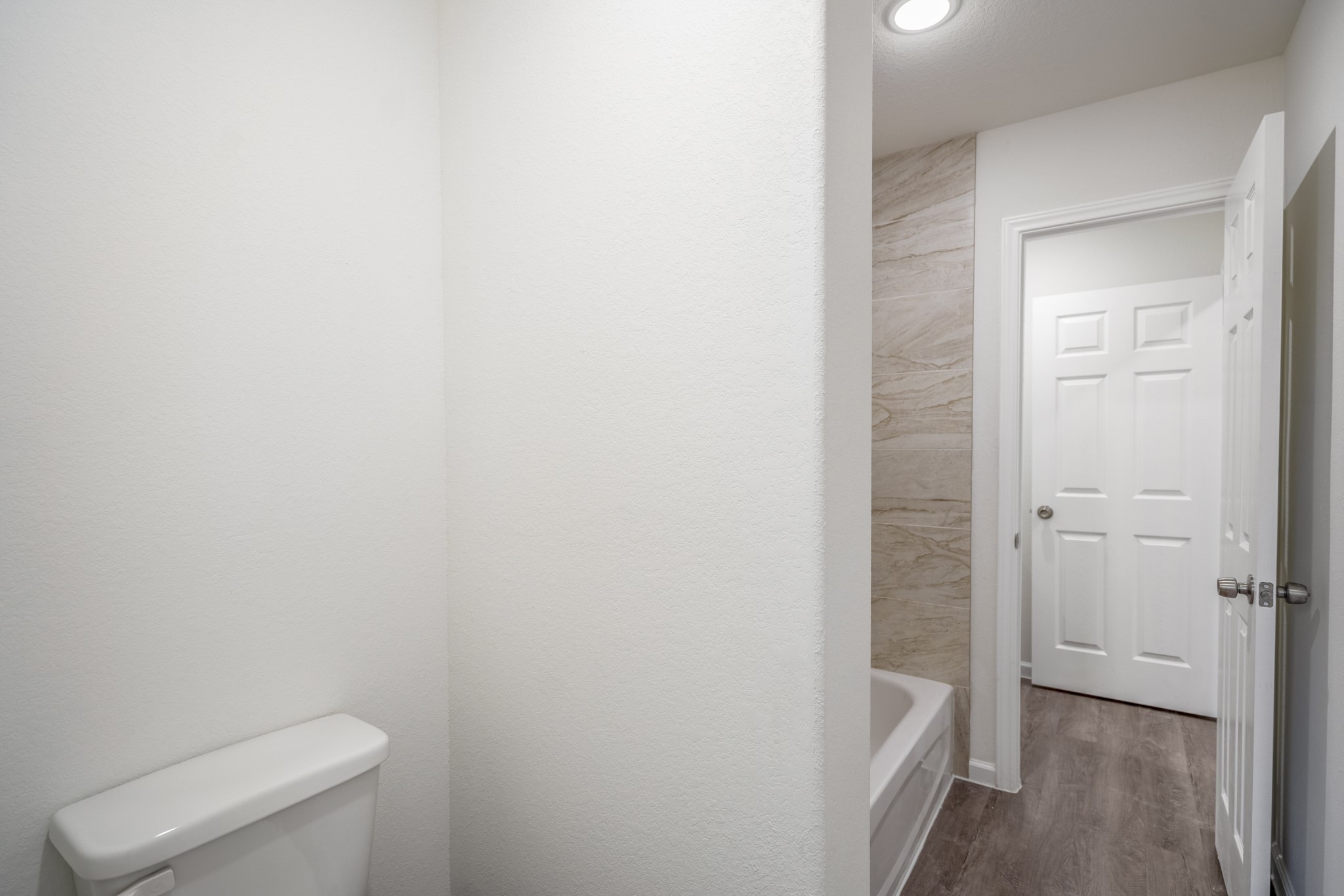 6513 Goldspier Street Houston, TX 77091 - Photo 25 of 31 a bathroom with a toilet