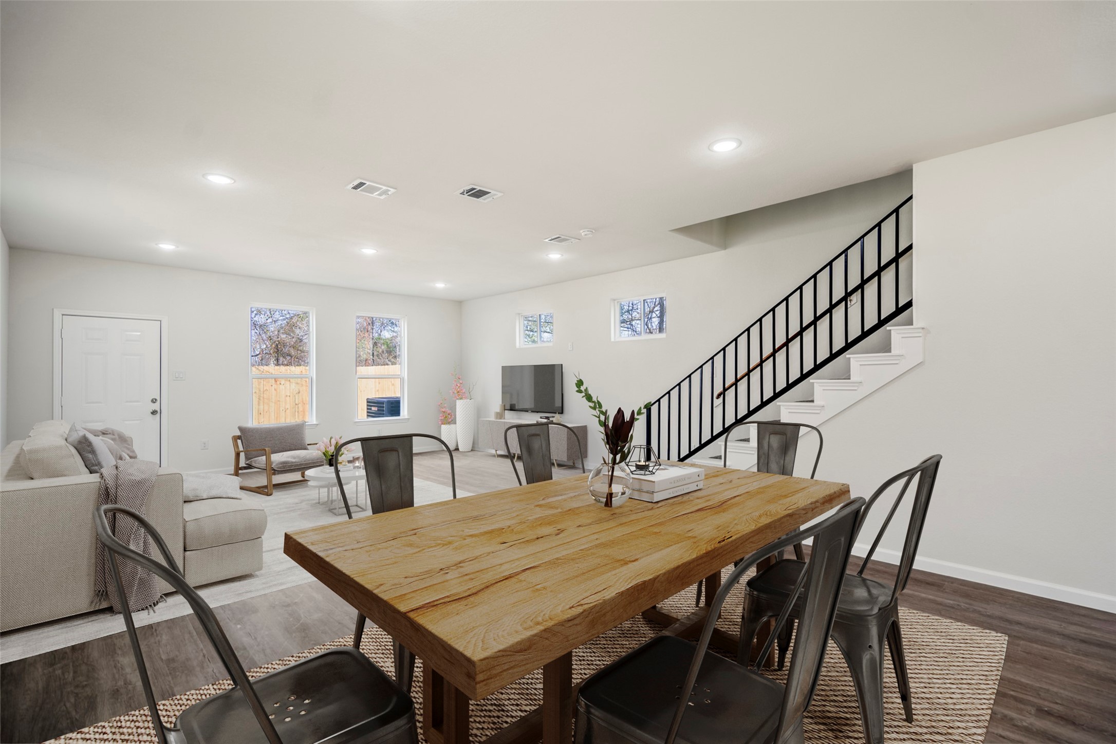 6513 Goldspier Street Houston, TX 77091 - Photo 7 of 31 a dining room with furniture and wooden floor