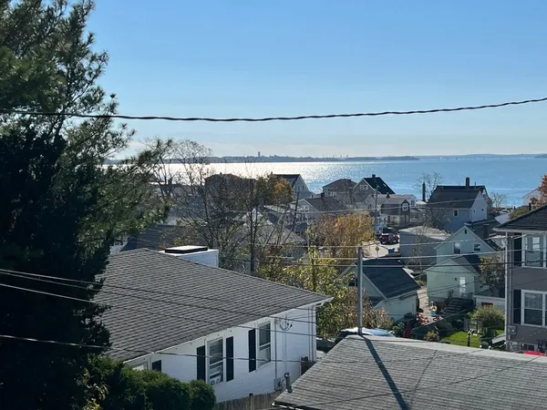 a view of a house with a street