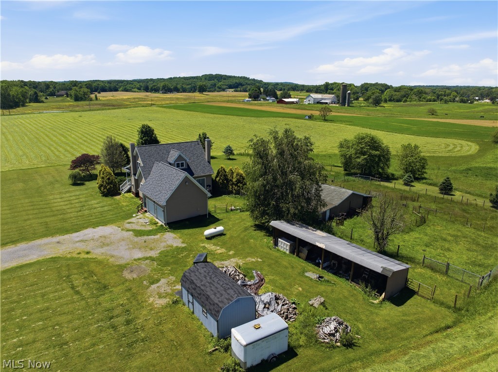 12159 Lawndell Road Southwest Beach City, OH 44608 - Photo 48 of 49 Expansive green acreage featuring multiple outbuildings and a detached garage structure