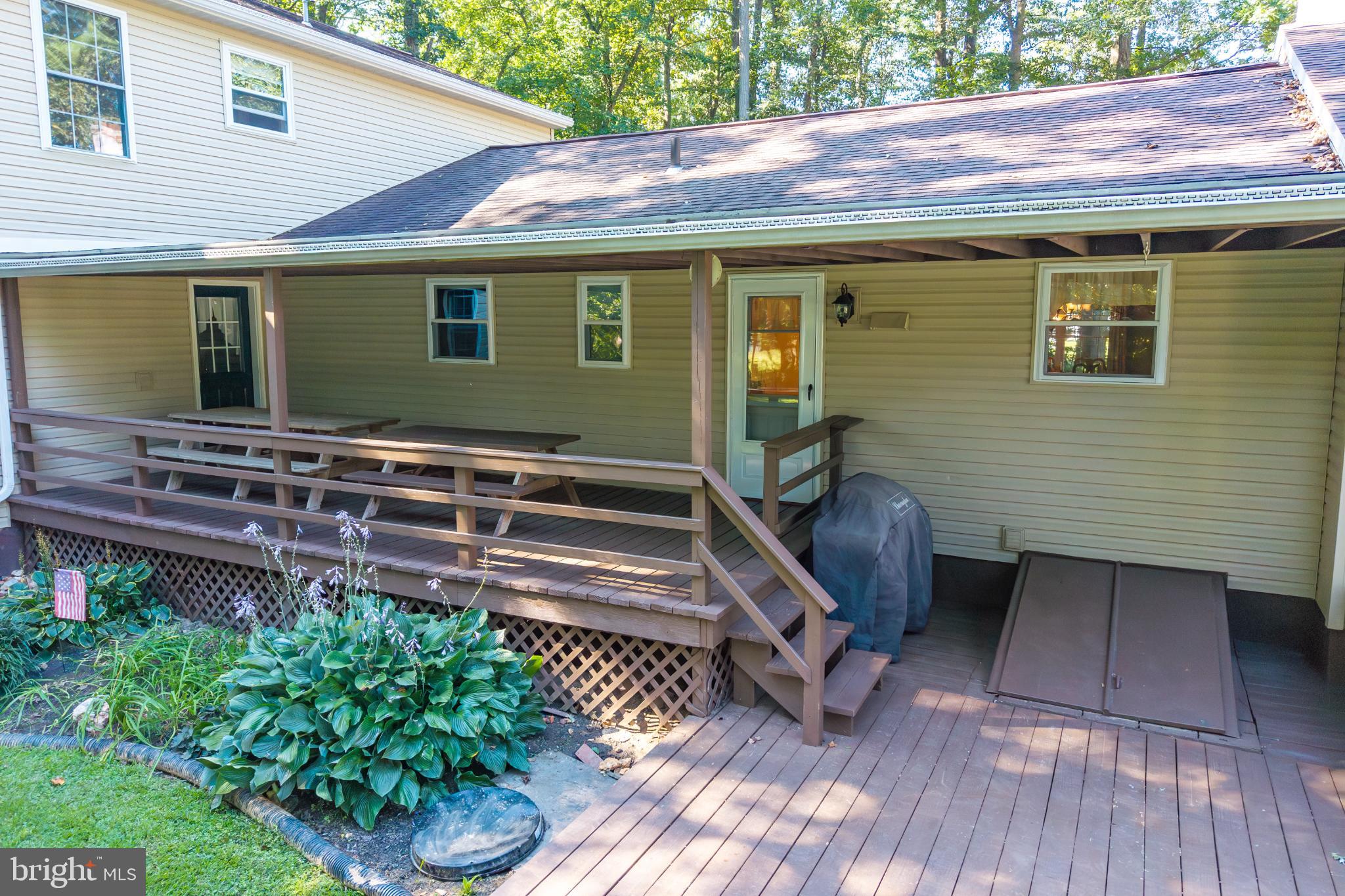 116 Cambridge Road Coatesville, PA 19320 - Photo 44 of 48 Charming deck nestled in a serene setting.