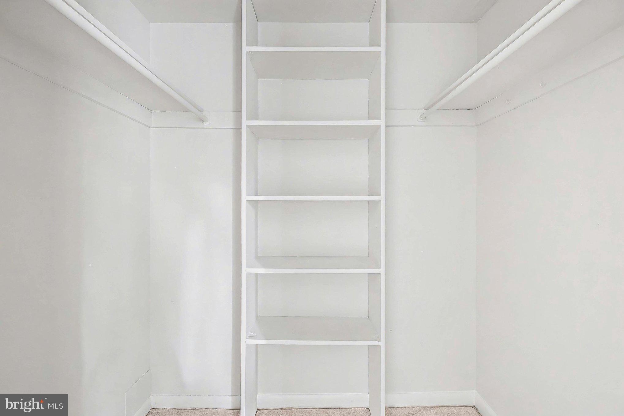 2247 Castle Rock Square, Unit 12C Reston, VA 20191 - Photo 17 of 23 Spacious, minimalist closet design.
