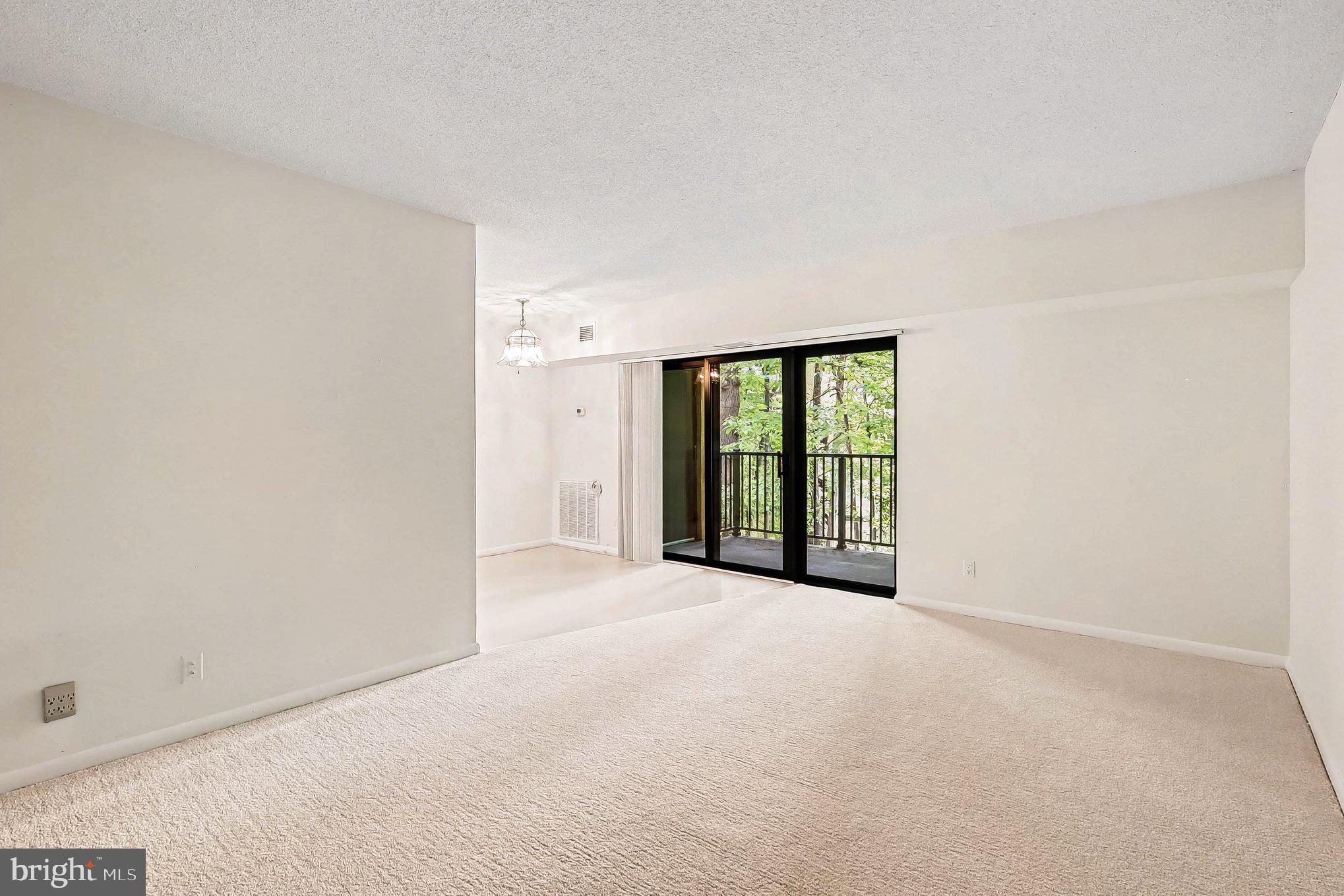 2247 Castle Rock Square, Unit 12C Reston, VA 20191 - Photo 2 of 23 Bright and airy living space awaits.