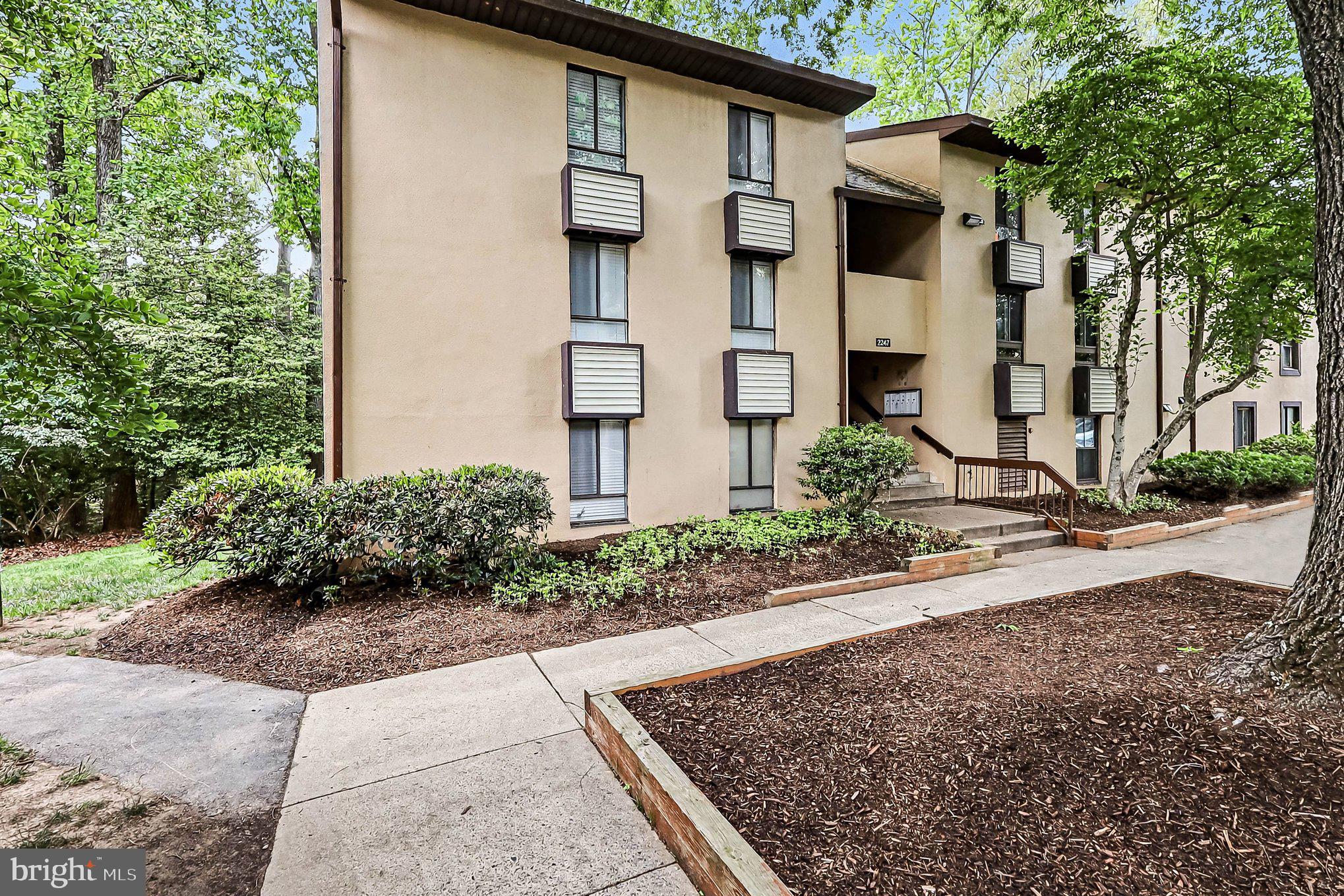 2247 Castle Rock Square, Unit 12C Reston, VA 20191 - Photo 22 of 23 Charming apartment nestled in nature.