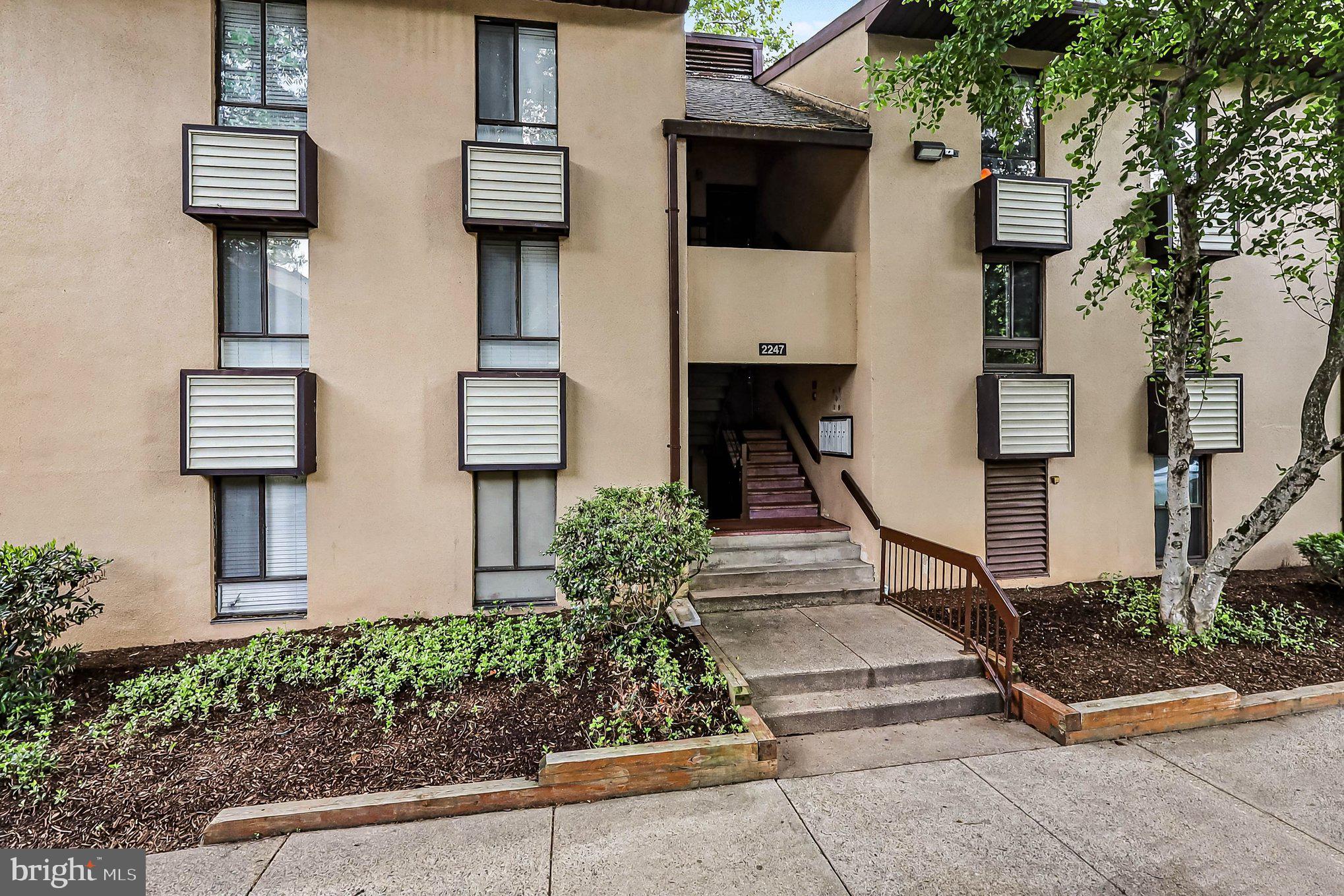2247 Castle Rock Square, Unit 12C Reston, VA 20191 - Photo 23 of 23 Charming entrance to modern living.