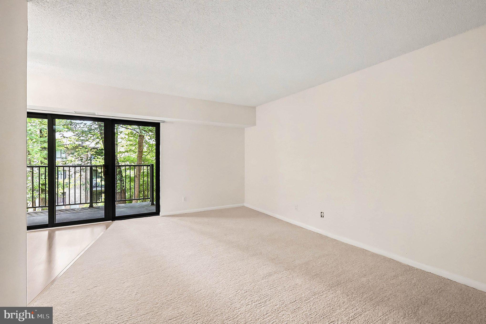 2247 Castle Rock Square, Unit 12C Reston, VA 20191 - Photo 3 of 23 Bright and airy living space awaits.