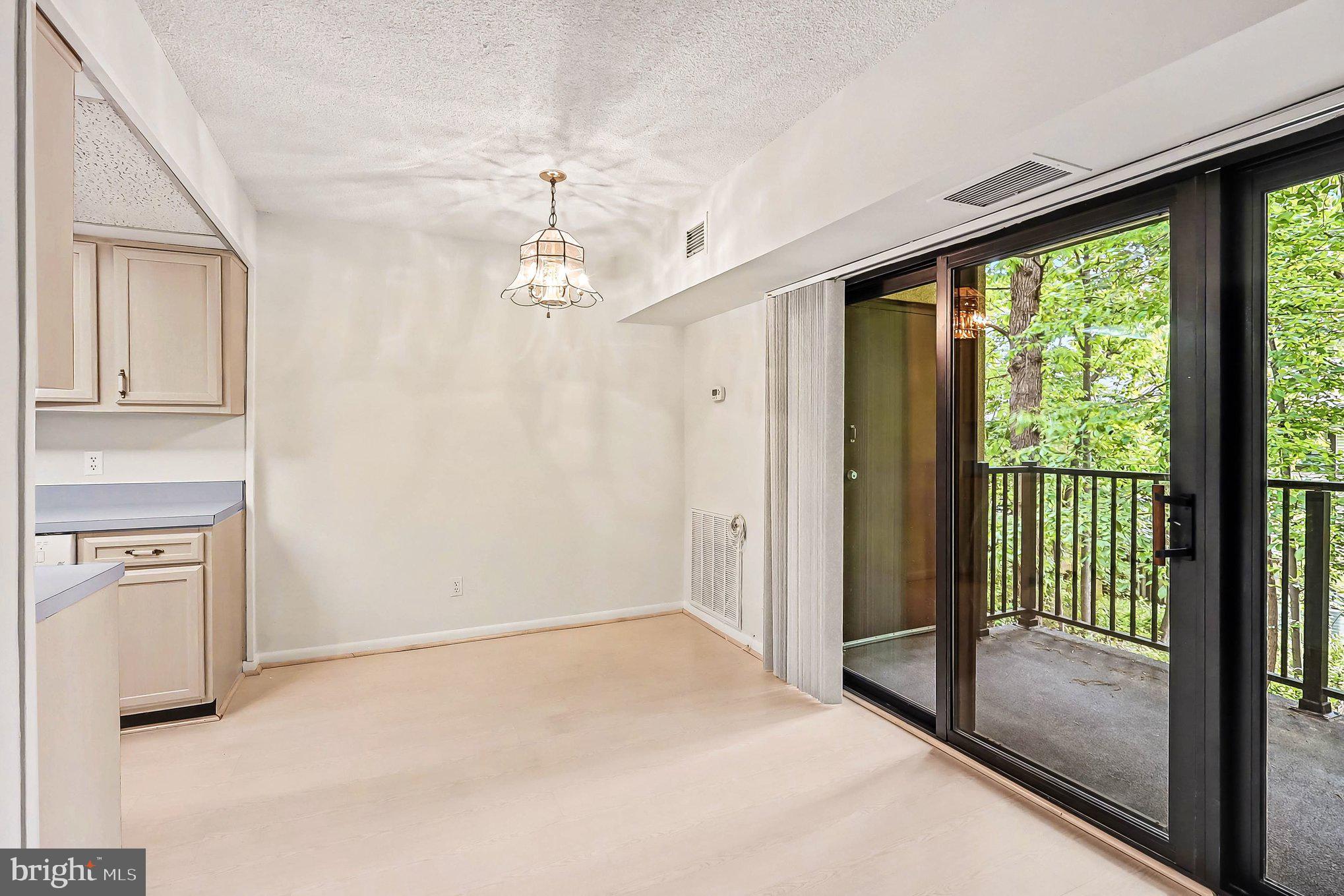 2247 Castle Rock Square, Unit 12C Reston, VA 20191 - Photo 7 of 23 Serene space with nature views.