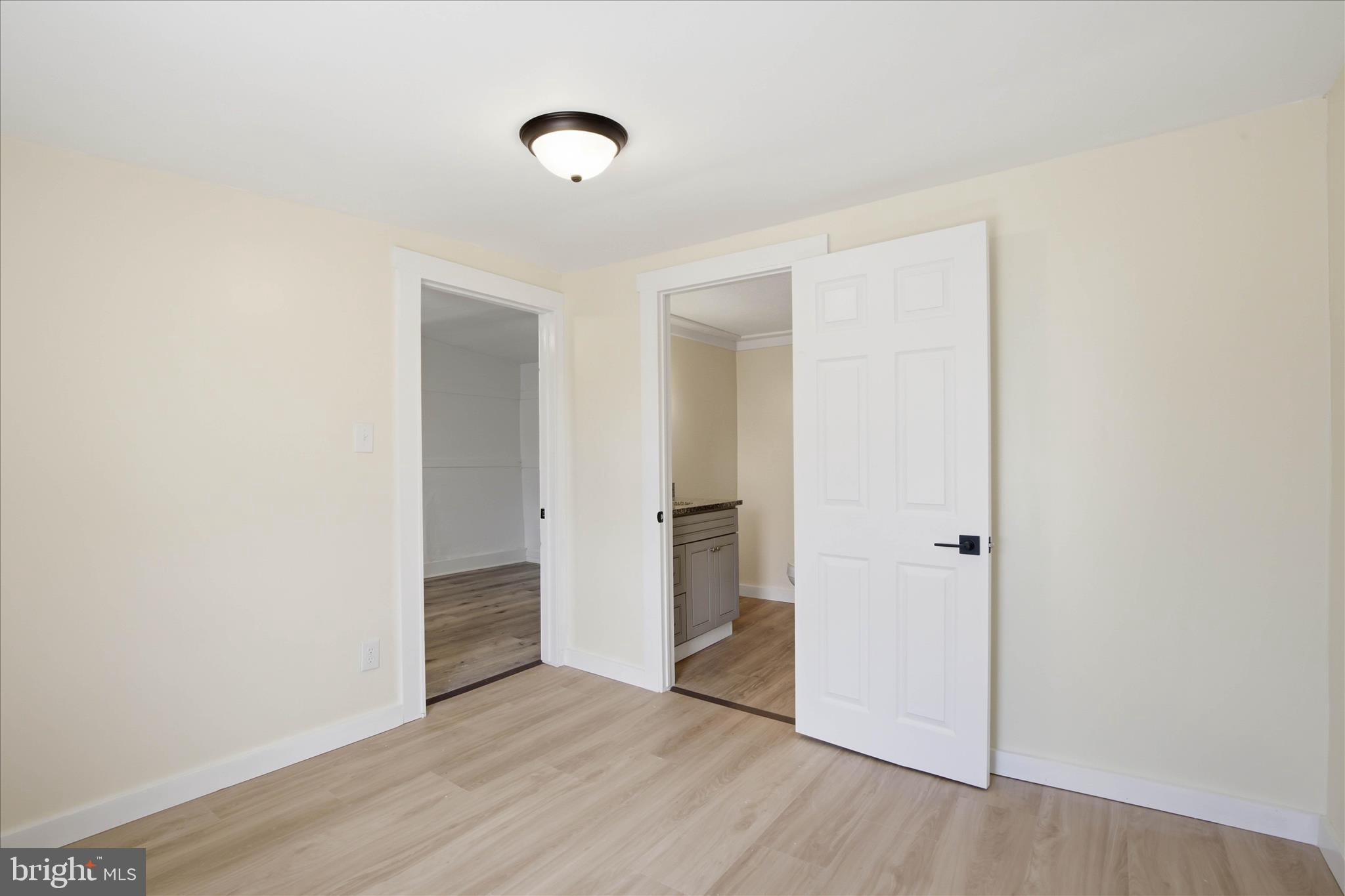 101 East Lincoln Avenue Lititz, PA 17543 - Photo 32 of 39 a view of an empty room with wooden floor