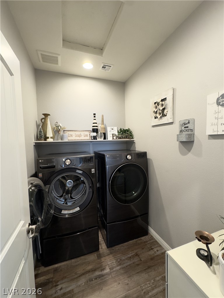78 Summer Rhapsody Avenue Henderson, NV 89015 - Photo 18 of 31 Laundry area featuring dark wood finished floors and separate washer and dryer