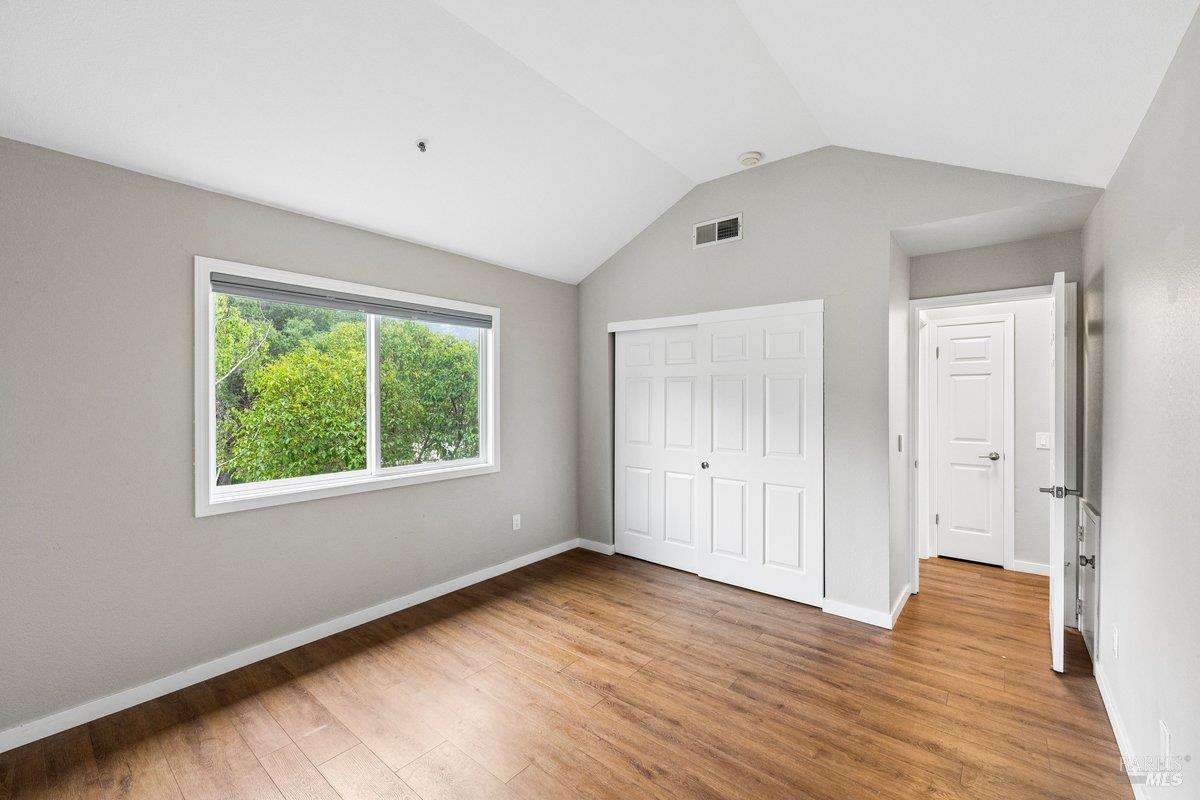 4 Courtney Lane Mill Valley, CA 94941 - Photo 12 of 14 a view of an empty room with wooden floor and a window