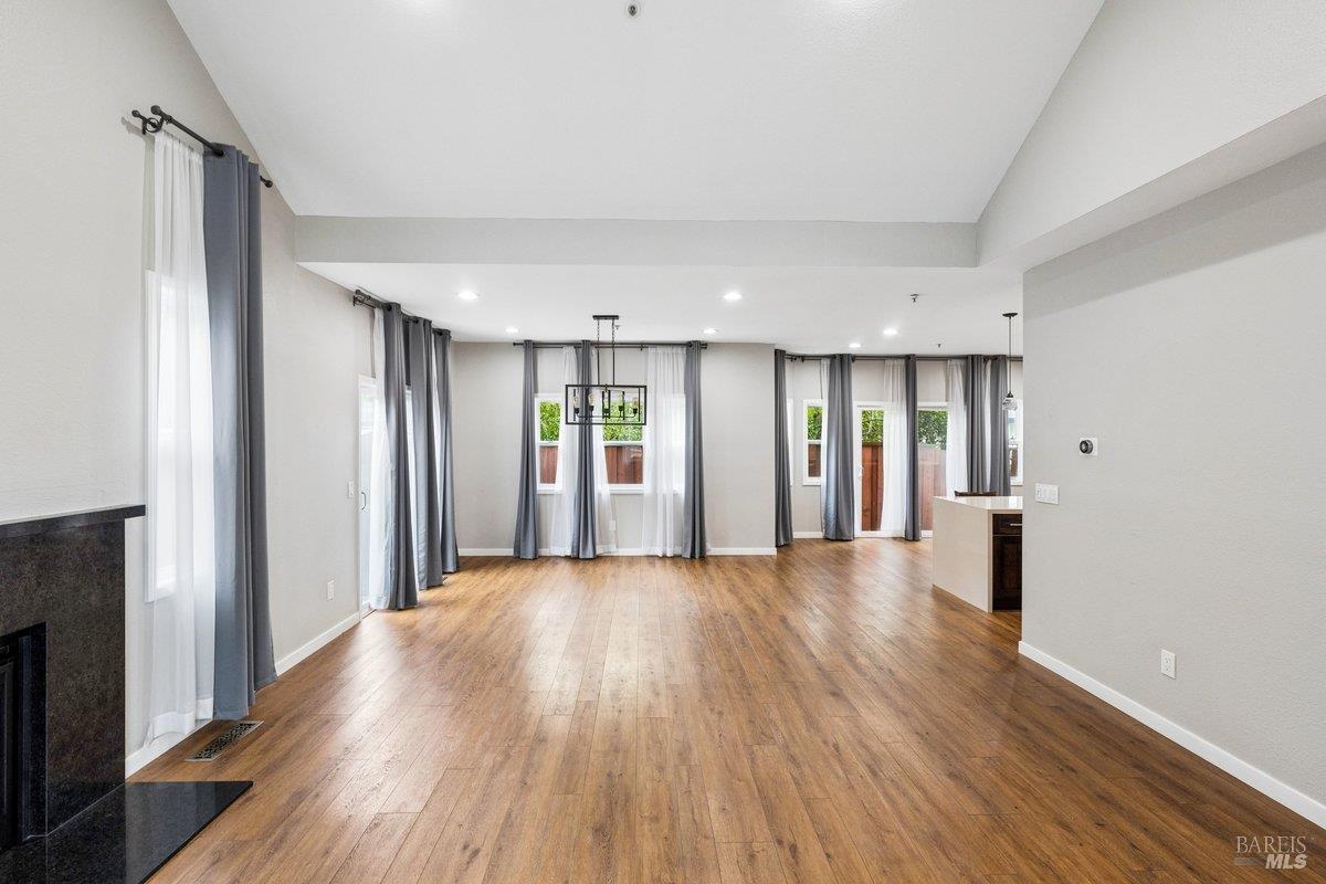 4 Courtney Lane Mill Valley, CA 94941 - Photo 3 of 14 a view of an empty room with wooden floor and a window