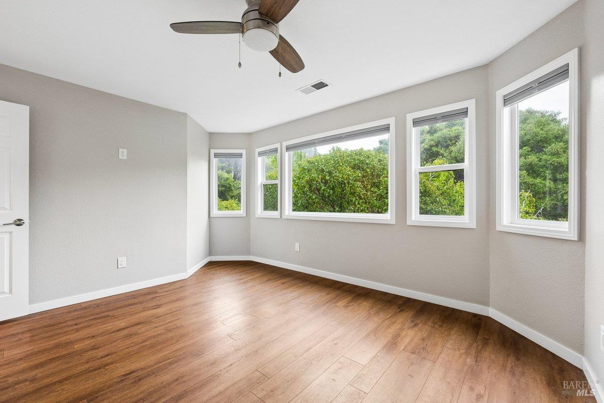4 Courtney Lane Mill Valley, CA 94941 - Photo 10 of 14 a view of an empty room with wooden floor and a window