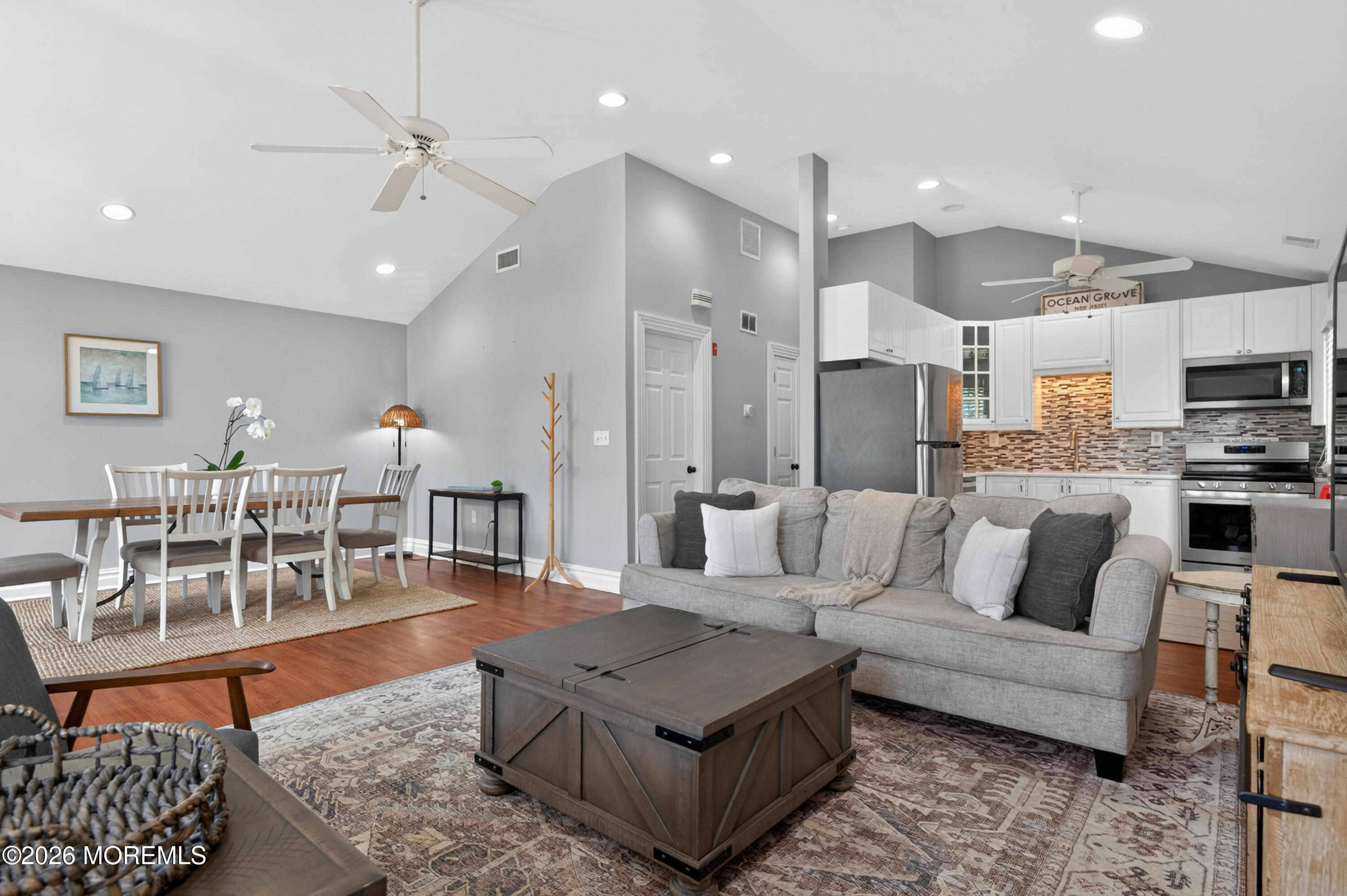 65 Heck Avenue Ocean Grove, NJ 07756 - Photo 15 of 37 a living room with furniture kitchen view and a table