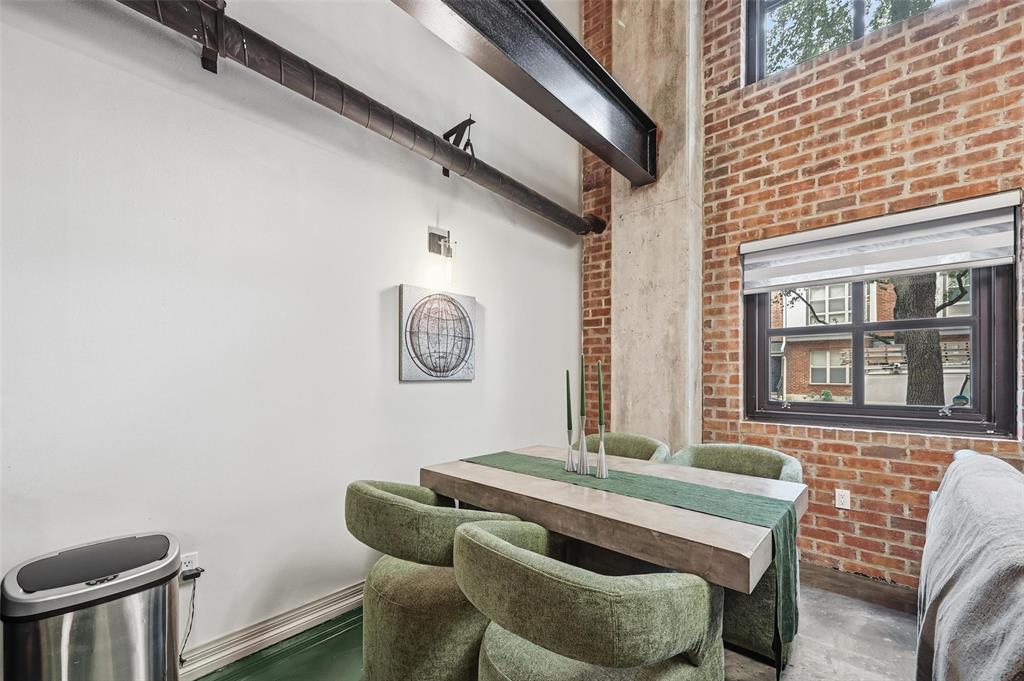 3110 Thomas Avenue, Unit 105 Dallas, TX 75204 - Photo 12 of 37 a front view of a house with outdoor seating