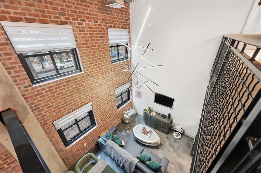 3110 Thomas Avenue, Unit 105 Dallas, TX 75204 - Photo 26 of 37 a view of a dinning table and chairs in the balcony