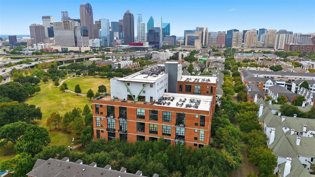 3110 Thomas Avenue, Unit 105 Dallas, TX 75204 - Photo 28 of 37 a view of a city with tall buildings