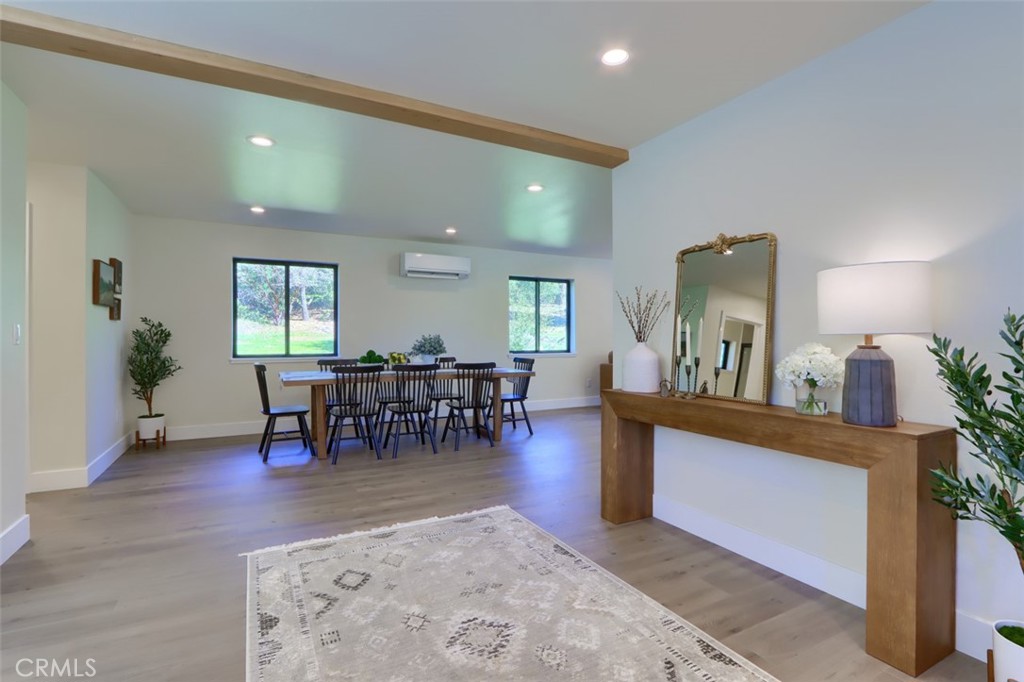 3181 B Triangle Park Road Mariposa, CA 95338 - Photo 12 of 44 a view of a dining room with furniture and a livingroom