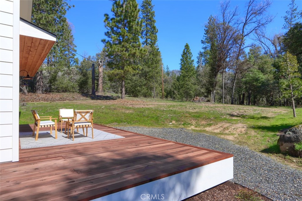 3181 B Triangle Park Road Mariposa, CA 95338 - Photo 37 of 44 a view of a backyard with wooden floor