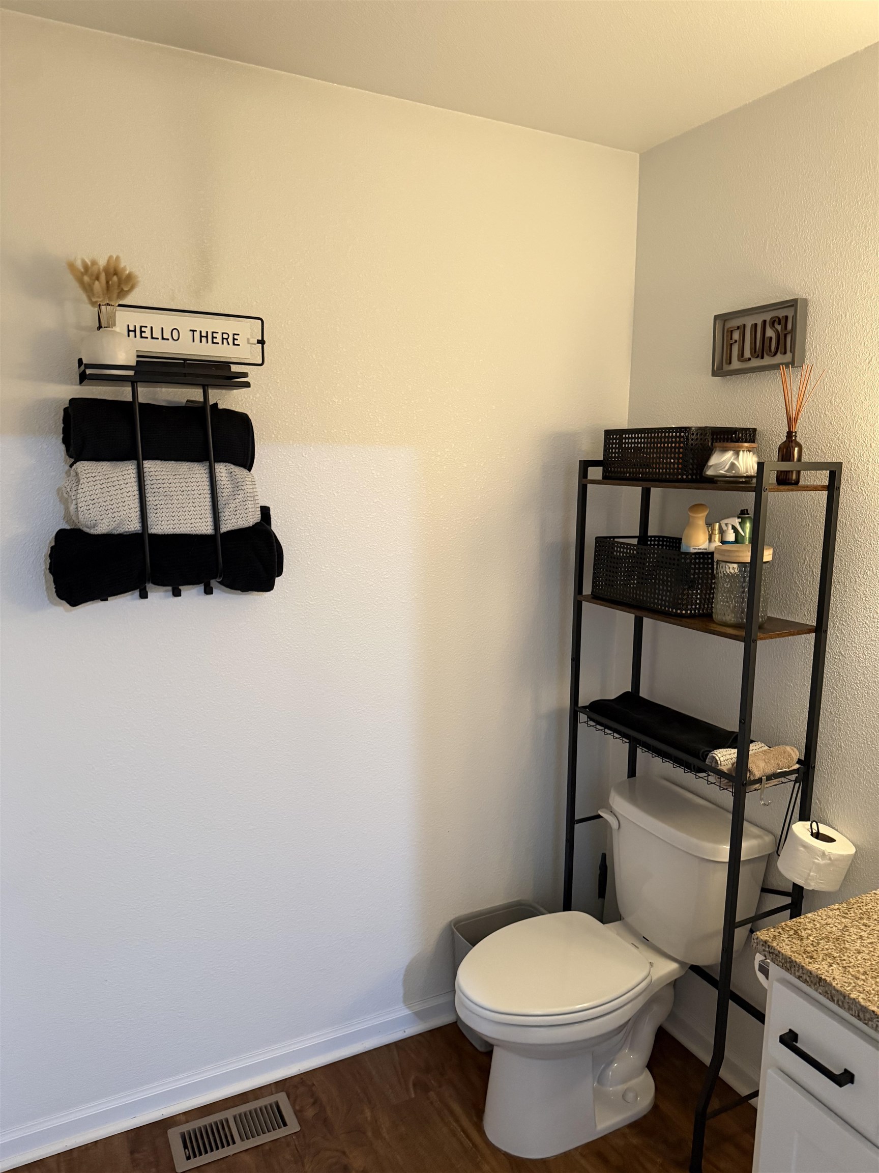 1135 Russell Road Belvidere, IL 61008 - Photo 4 of 11 a bathroom with a toilet and a sink