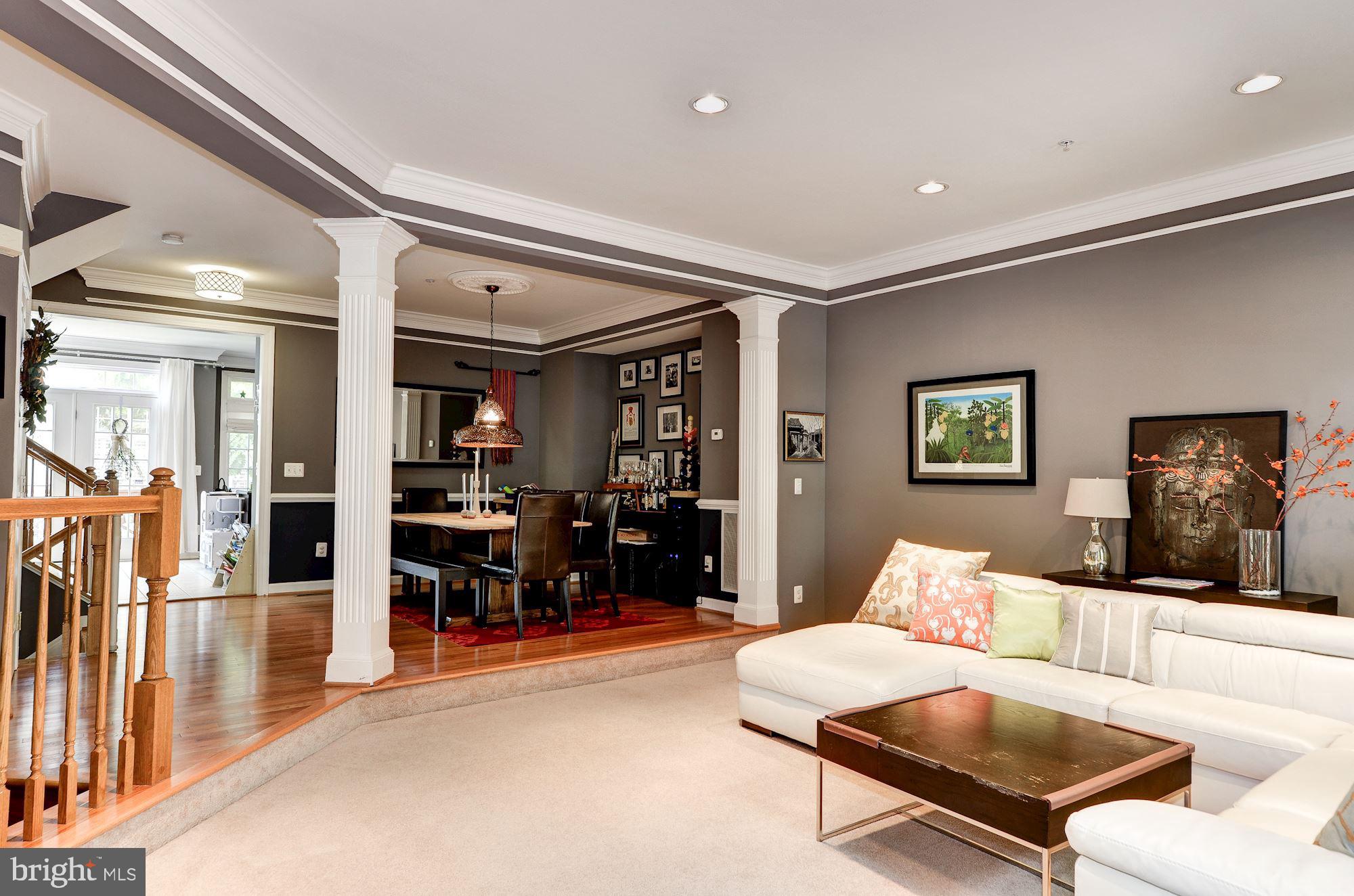 4908 Waple Lane Alexandria, VA 22304 - Photo 2 of 36 a living room with furniture and a flat screen tv