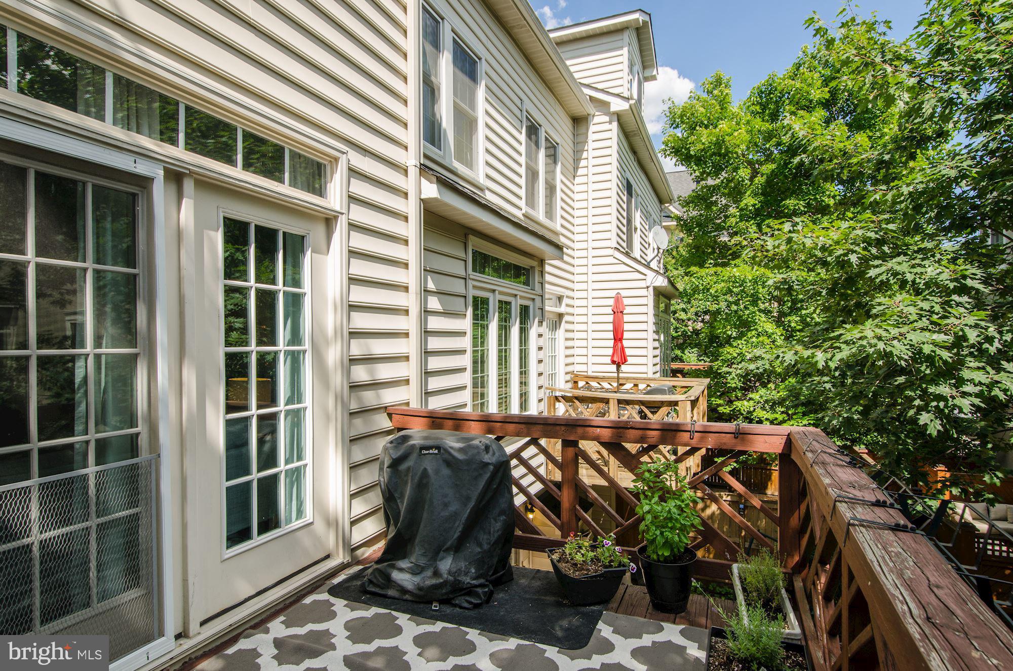4908 Waple Lane Alexandria, VA 22304 - Photo 29 of 36 a view of a house with backyard and sitting area