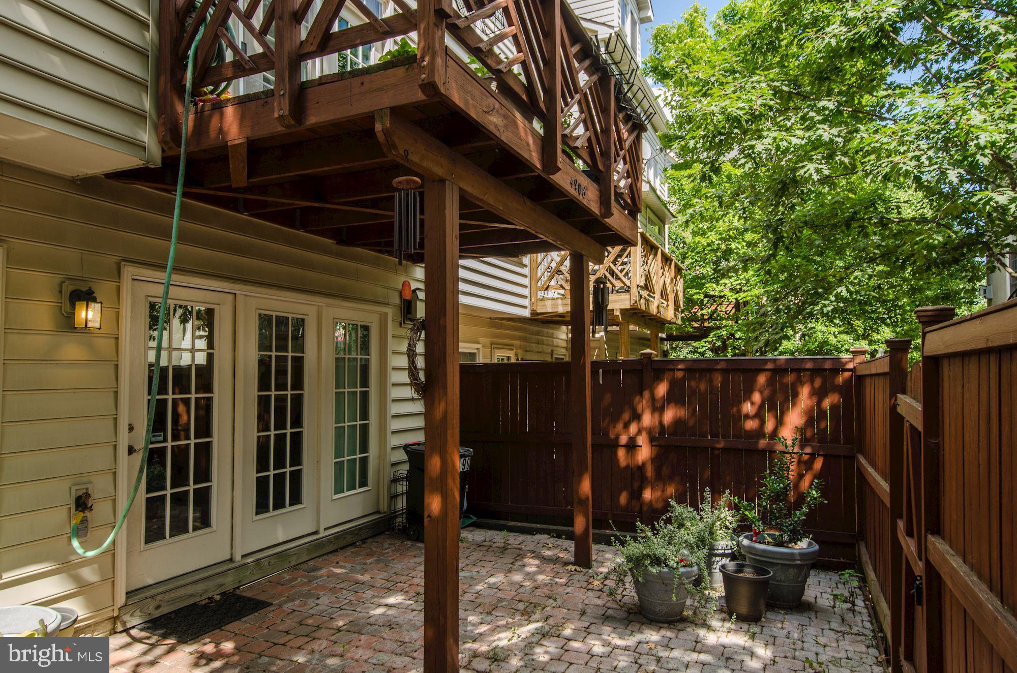 4908 Waple Lane Alexandria, VA 22304 - Photo 32 of 36 a view of a chair and table in the patio