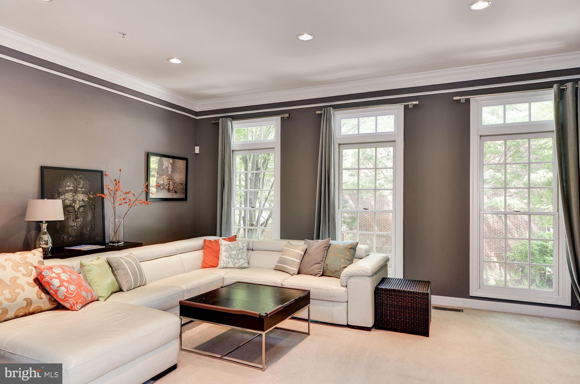 4908 Waple Lane Alexandria, VA 22304 - Photo 4 of 36 a living room with furniture and a large window