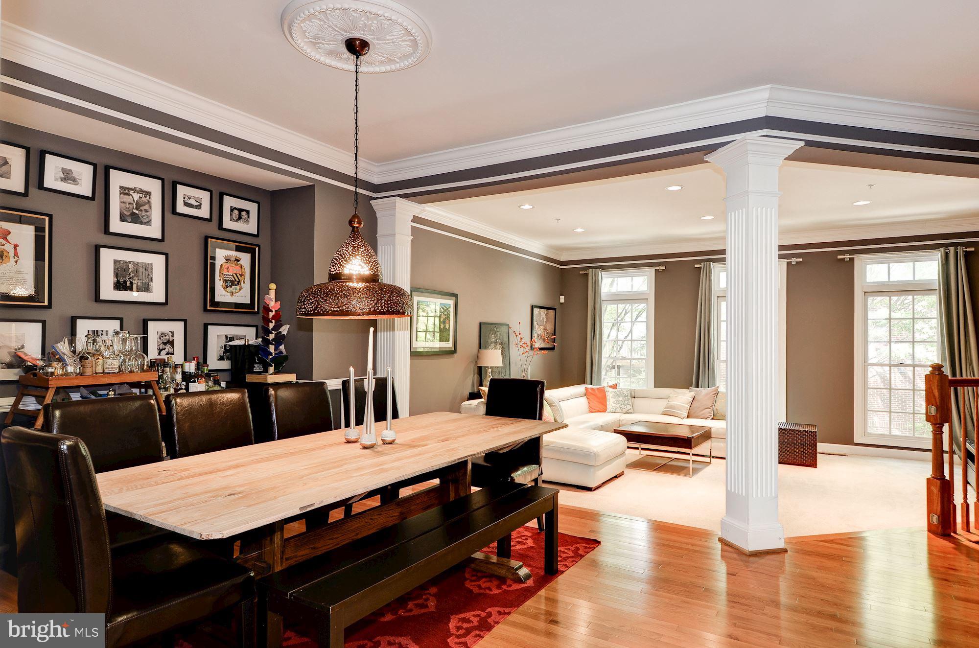 4908 Waple Lane Alexandria, VA 22304 - Photo 9 of 36 a large kitchen with a table and chairs