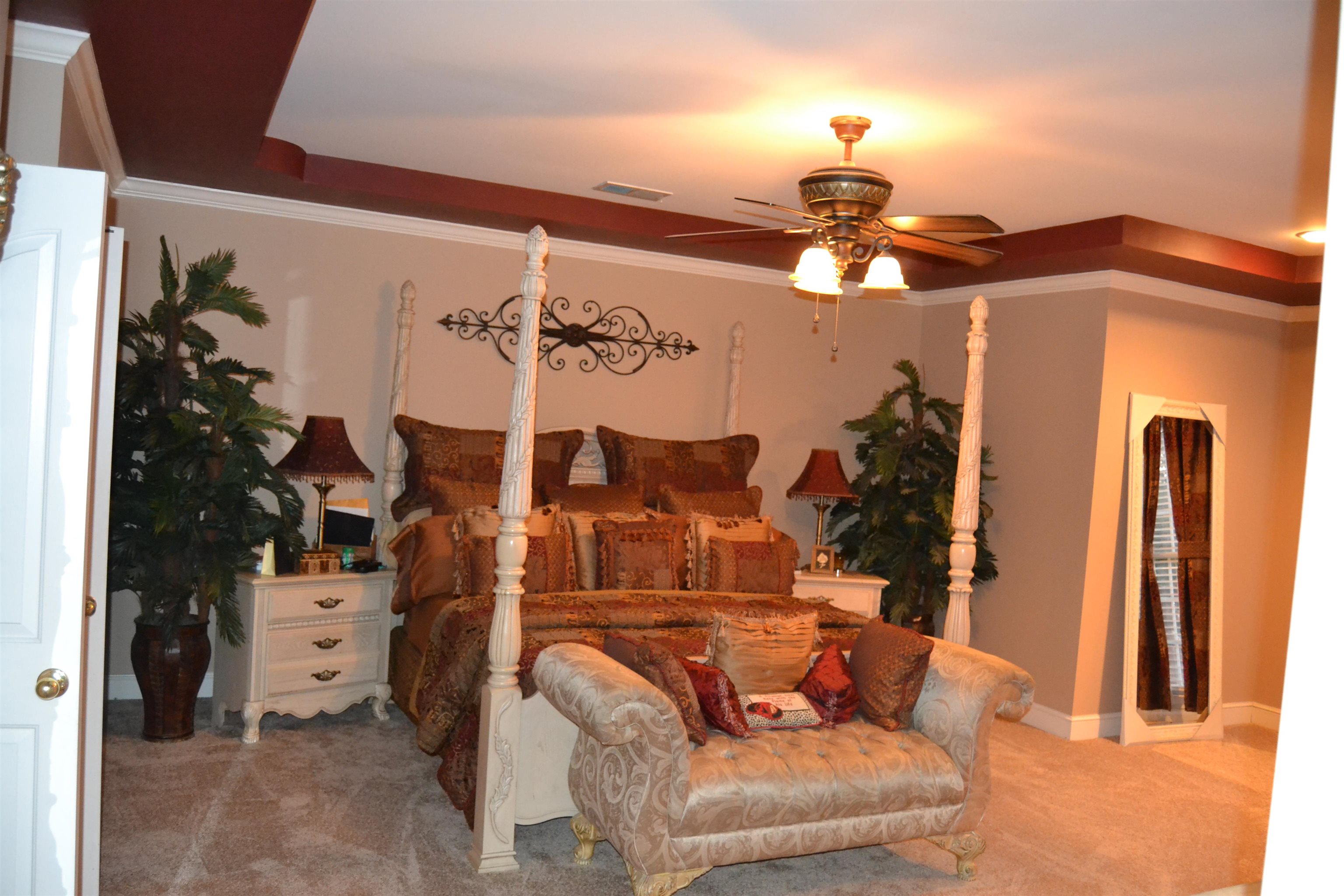 1364 Winoka Road Collierville, TN 38017 - Photo 13 of 25 a living room with furniture and a chandelier